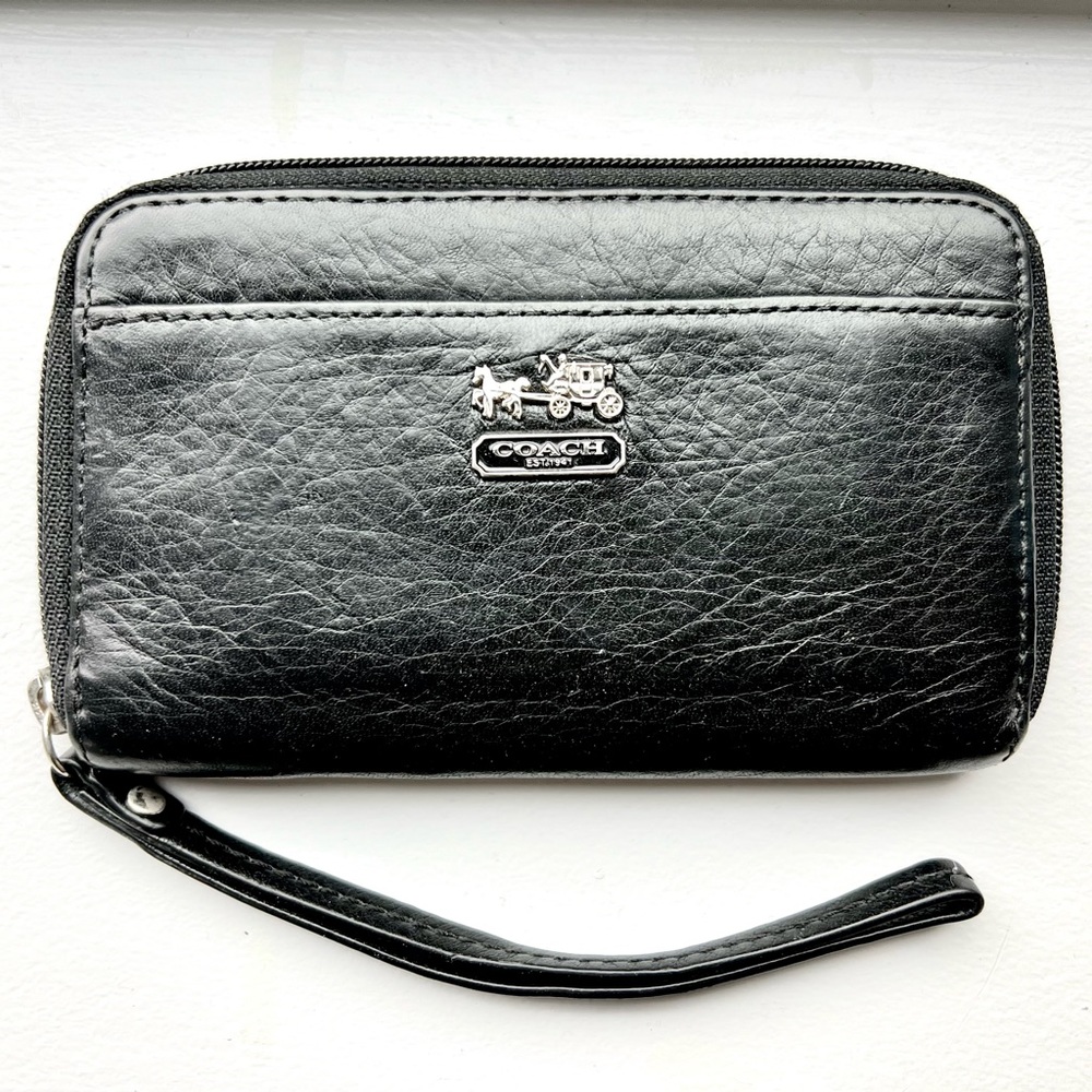 Coach wristlet black with purple inside